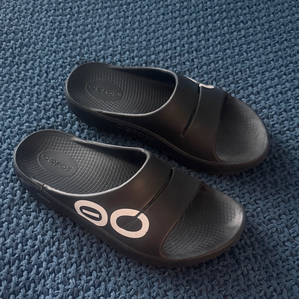 OOFOS Black Slide Sandals with White Logo